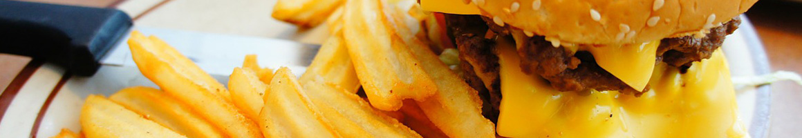 Eating Burger at Burger Town USA restaurant in Fontana, CA.